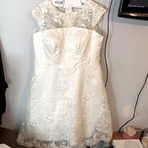Wedding Dress. Brand new never worn with tags still one. Size 20 W. White